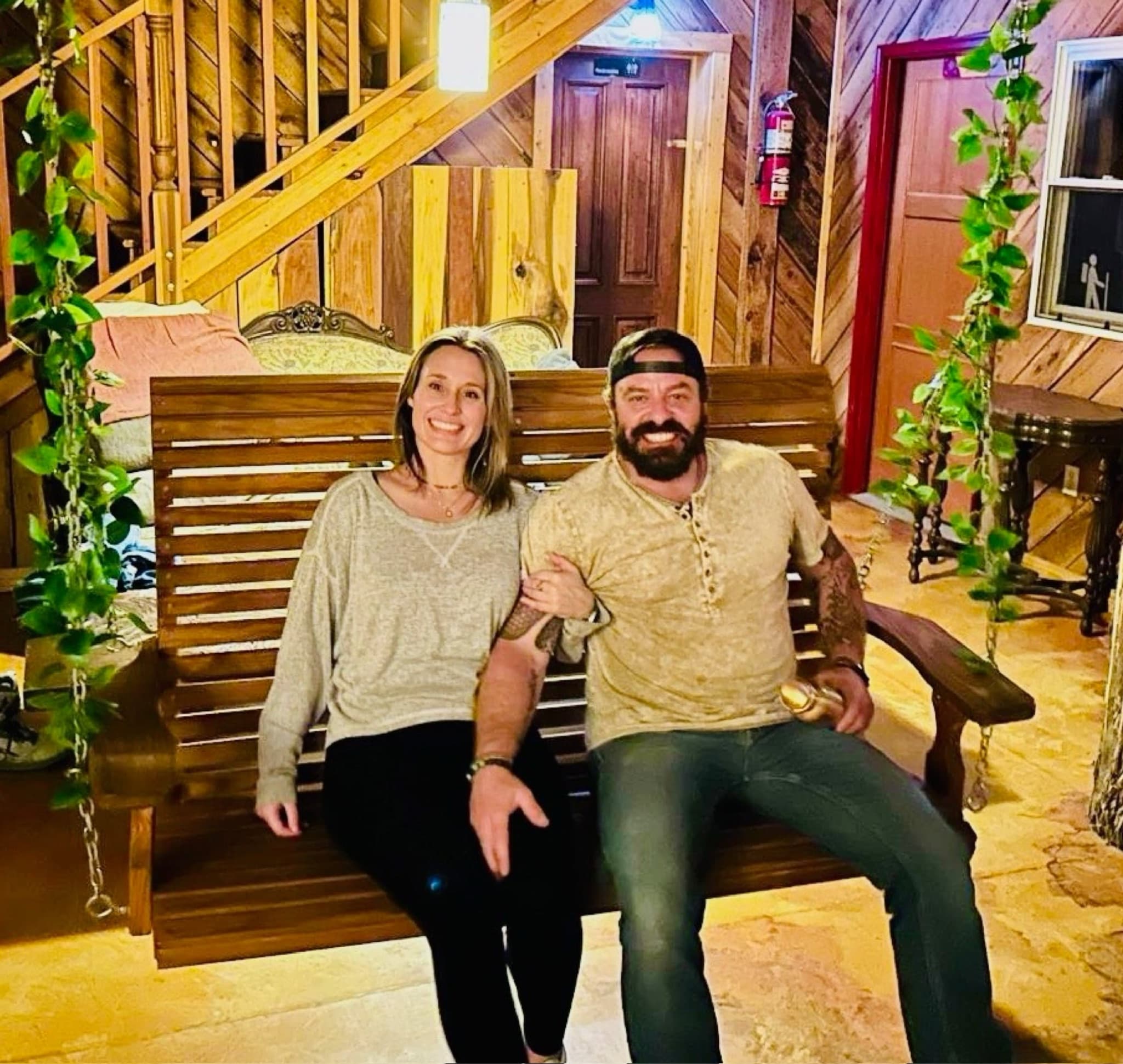 Couple on porch swing in lodge