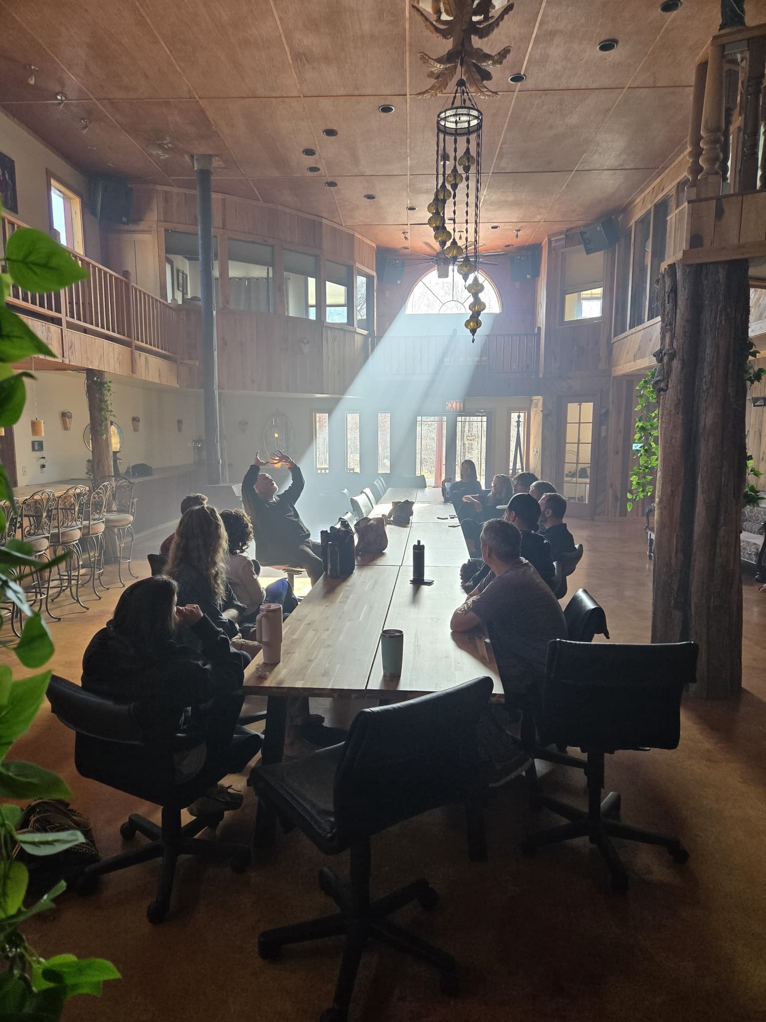 Long table discussion with light beam